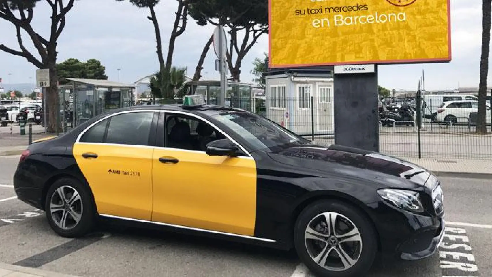 Black and yellow Mercedes E-Class